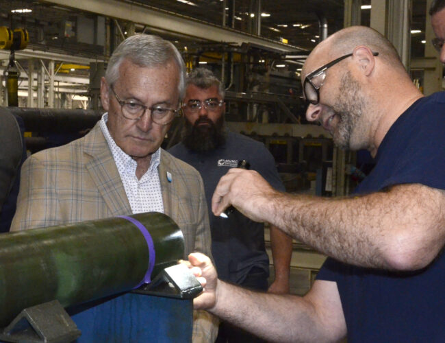 Tressel highlights jobs program during Austintown business visit